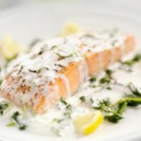 Salmon trout on creamy spinach